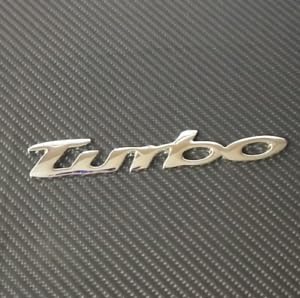 Cursive Style Small Letter Turbo Metal Logo 3D Car Hood Ornament / Decal For Car Bike Cycle