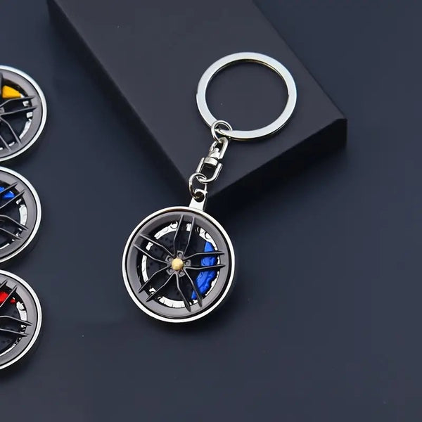 Rotatable Car Hub Keychain - Stylish Alloy Pendant for Vehicle Enthusiasts, Perfect Gift Idea
