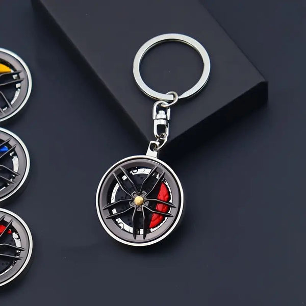 Red Color 360 Rotatable Car Hub Keychain - Stylish Alloy Pendant for Vehicle Enthusiasts, Perfect Gift Idea